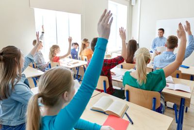 group of high school students and teacher