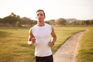 Nature, running and man with fitness on trail for...