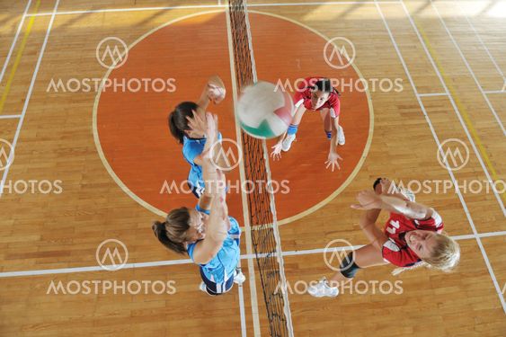 girls playing volleyball indoor game