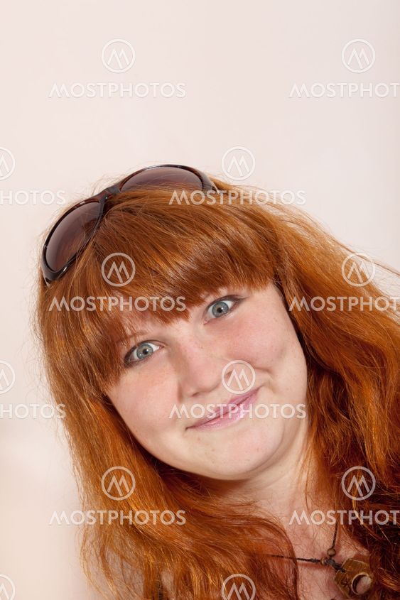 Headshot of cheerful redhead