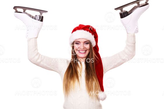 woman santa claus with ice skates