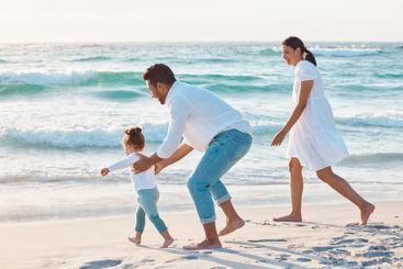 Support, walking or parents in ocean with baby or love...