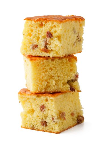 Delicious traditional dessert squares stacked with a...