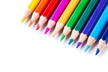 Brightly colored pencils arranged neatly for artistic...