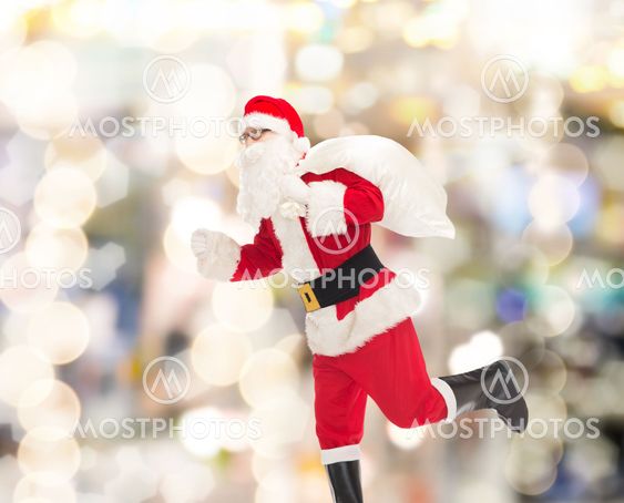 man in costume of santa claus with bag
