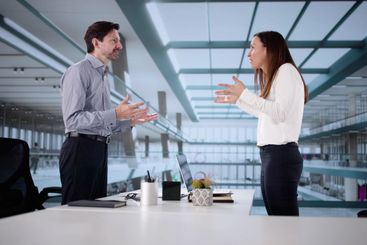 Corporate Quarrel: Two Professionals Argue At Office