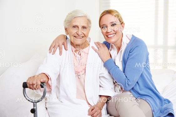 Family with senior woman at home
