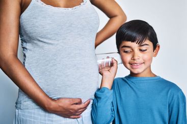 Pregnant, woman and child with glass for listening,...
