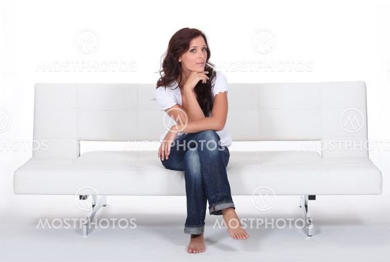 woman sitting on a couch