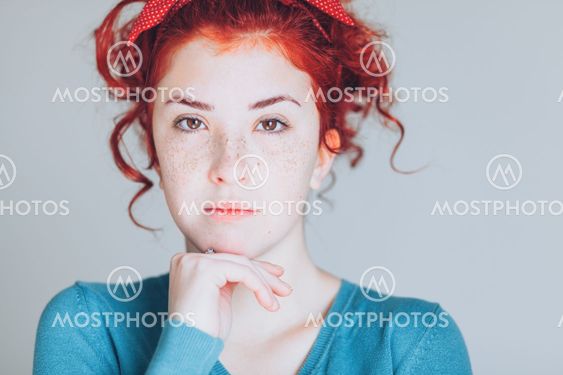 Beautiful young redhead woman