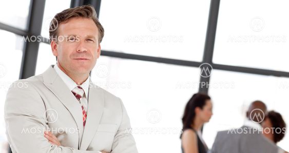 Caucasian male manager leading his team
