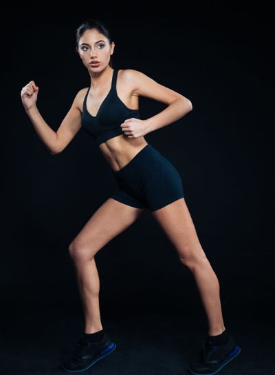Full length portrait of a fitness woman
