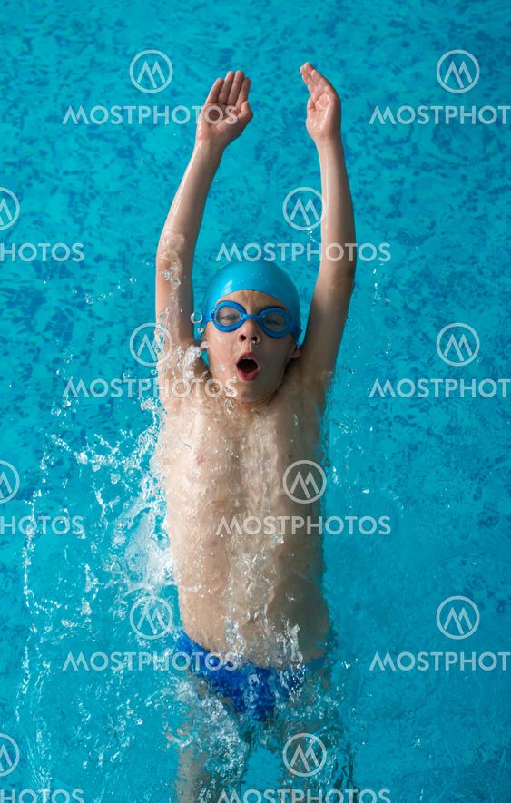 Child swimmer in swimming pool