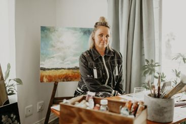 Creative, landscape painting and portrait of woman in...