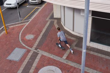 Riding, athlete and man with skateboard, street and...