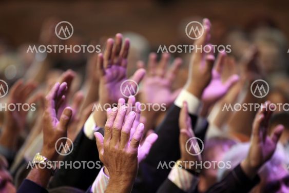 raised up a human hands at the event