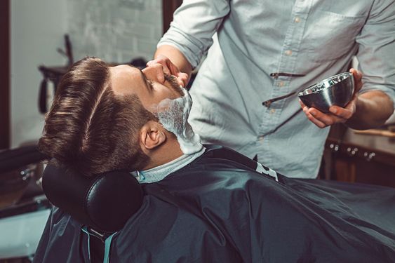 Hipster client visiting barber shop