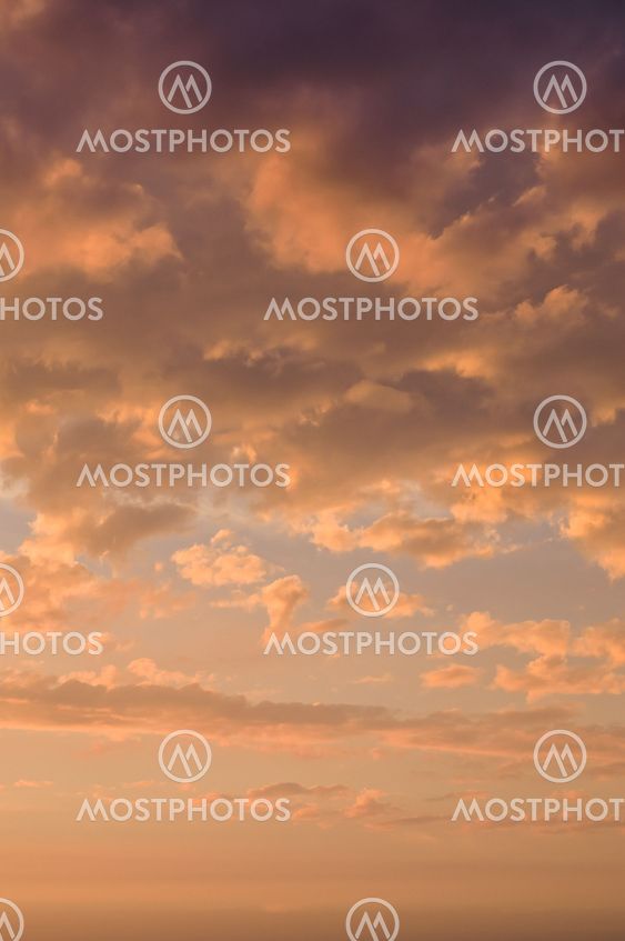 Colorful sundown sky and clouds vertical view