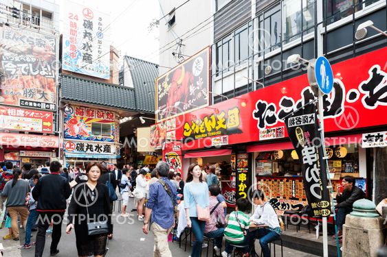 Osaka, Japan - April 2016: Tourist popular shopping scene in Osaka City at Dotonbori Namba area with signs and advertising billboards during daytime