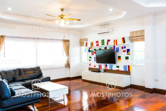 Modern room with TV and Flags for soccer championship 2014