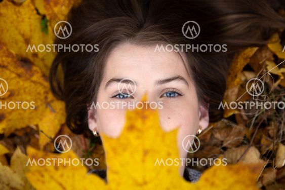 Top view of a cute girl with blue eyes, which in the...