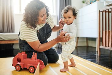 Relax, family and mother play with baby in living room...