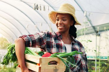 Greenhouse, vegetables and black woman with nature, food...