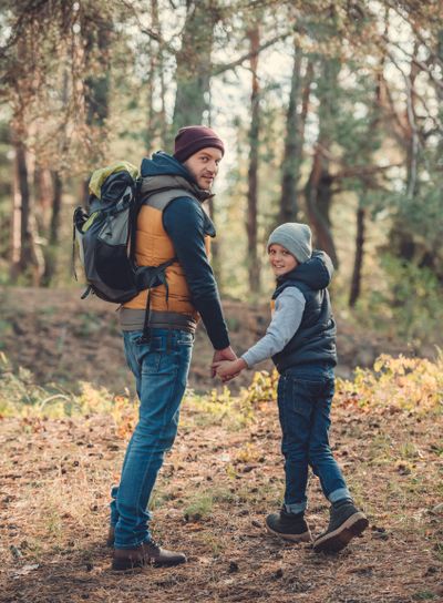 father and son hiking together