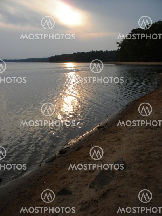 Dusk falls on lake.