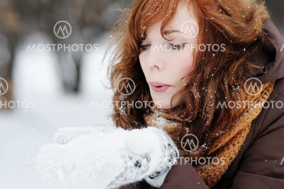Young woman having fun in winter
