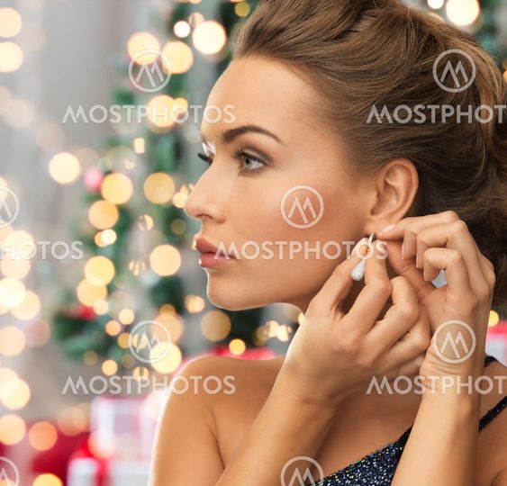 close up of woman wearing earrings