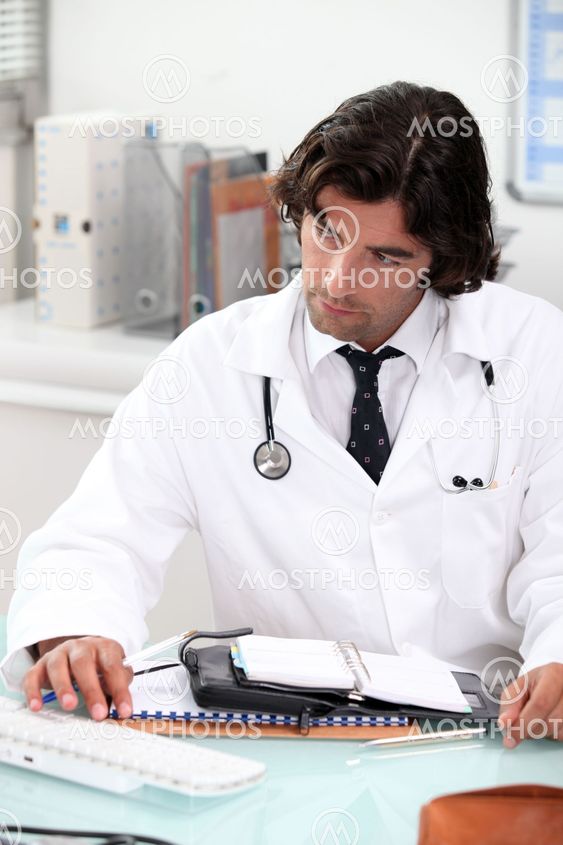 portrait of a doctor at desk