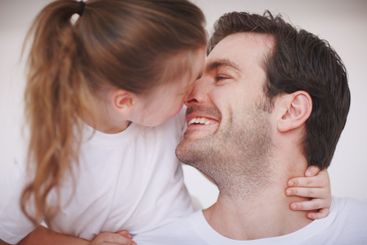 Daughter, dad and nose touch in home, fun and love for...