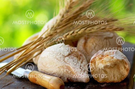 Portuguese bread and spikes of wheat.