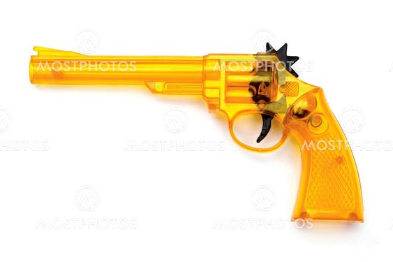 Toy plastic gun , on a white background