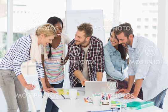 Smiling team of designers having a meeting