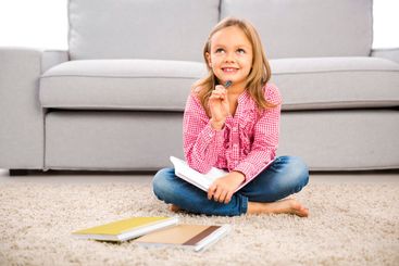 Little girl making homework