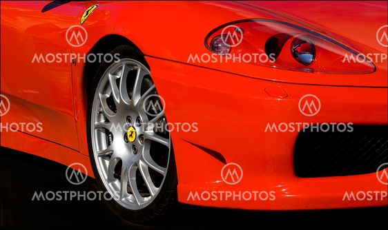 Close up, shiny red Ferrari