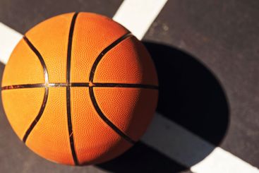 Sports, basketball and closeup for games on court, top...