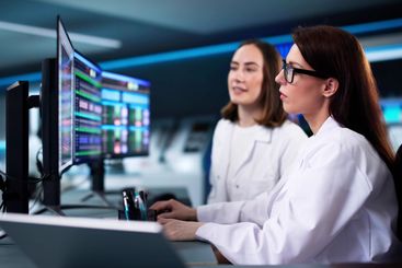 Female research scientist analyzing data