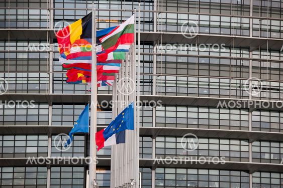 European Union Flags and France flag flies at half-mast