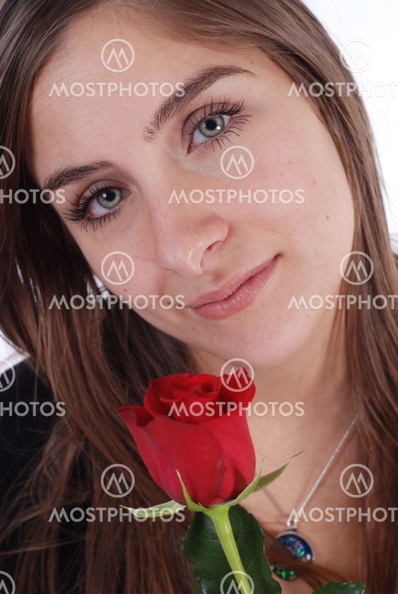 woman and rose on white