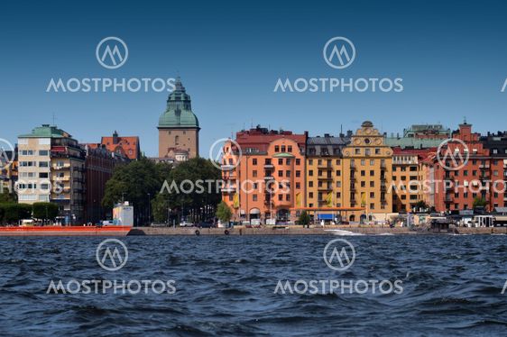 Waterside settlement full of iconic buildings at port of Kungsholmstorg brygga in Stockholm, Sweden