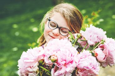 portrait of a happy cute little caucasian seven year old...