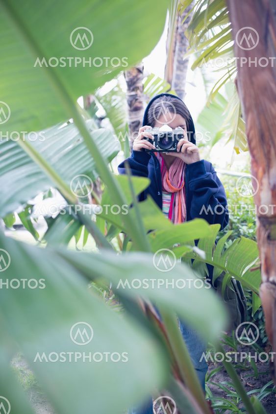 Attractive brunette taking a picture