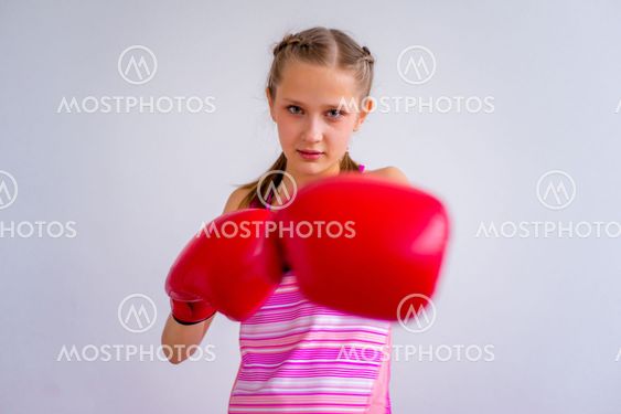 Teen girl boxing