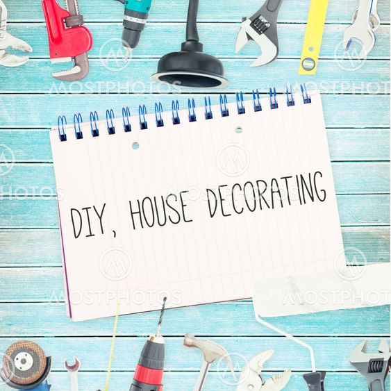 Diy, house decorating against tools and notepad on wooden background
