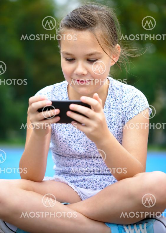 Girl is using smartphone
