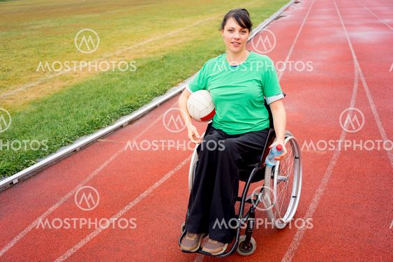 Disabled girl on a stadium