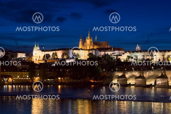 Pargue at dusk, view of the Charles Bridge and Prague...